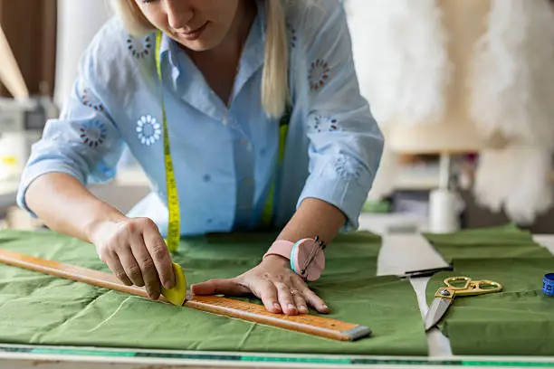 Bespoke Tailoring in Nairobi: What to Expect When Your Clothes Are Made Exclusively for You African client during a bespoke suit fitting