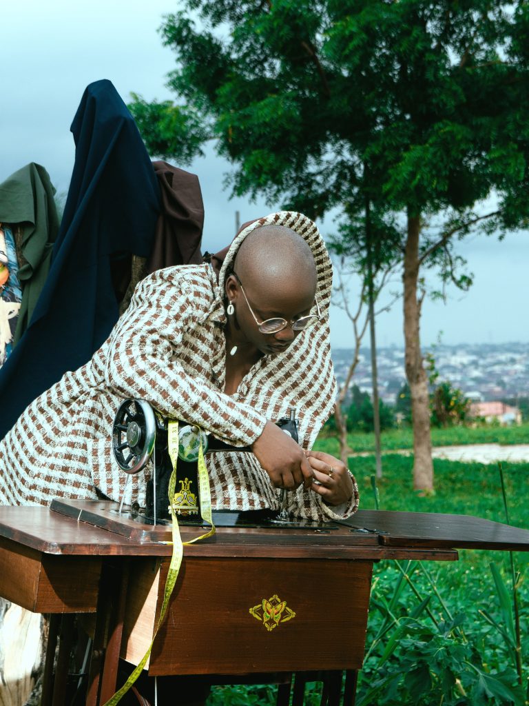 The Future of African Tailoring: How Modern African Style Is Redefining Bespoke Fashion Tailor working on a custom garment in Nairobi